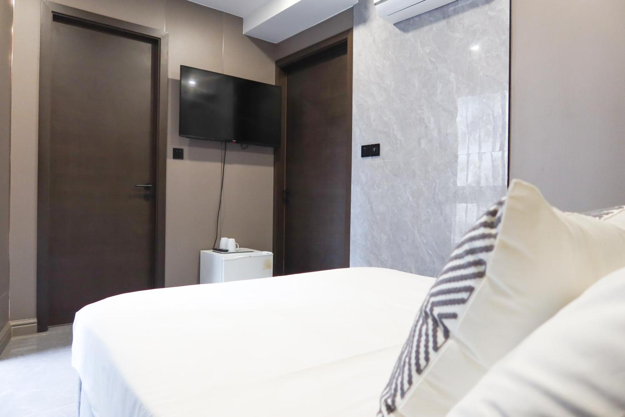 Recharge Studio Apartment & Suites Сінгапур Номер фото