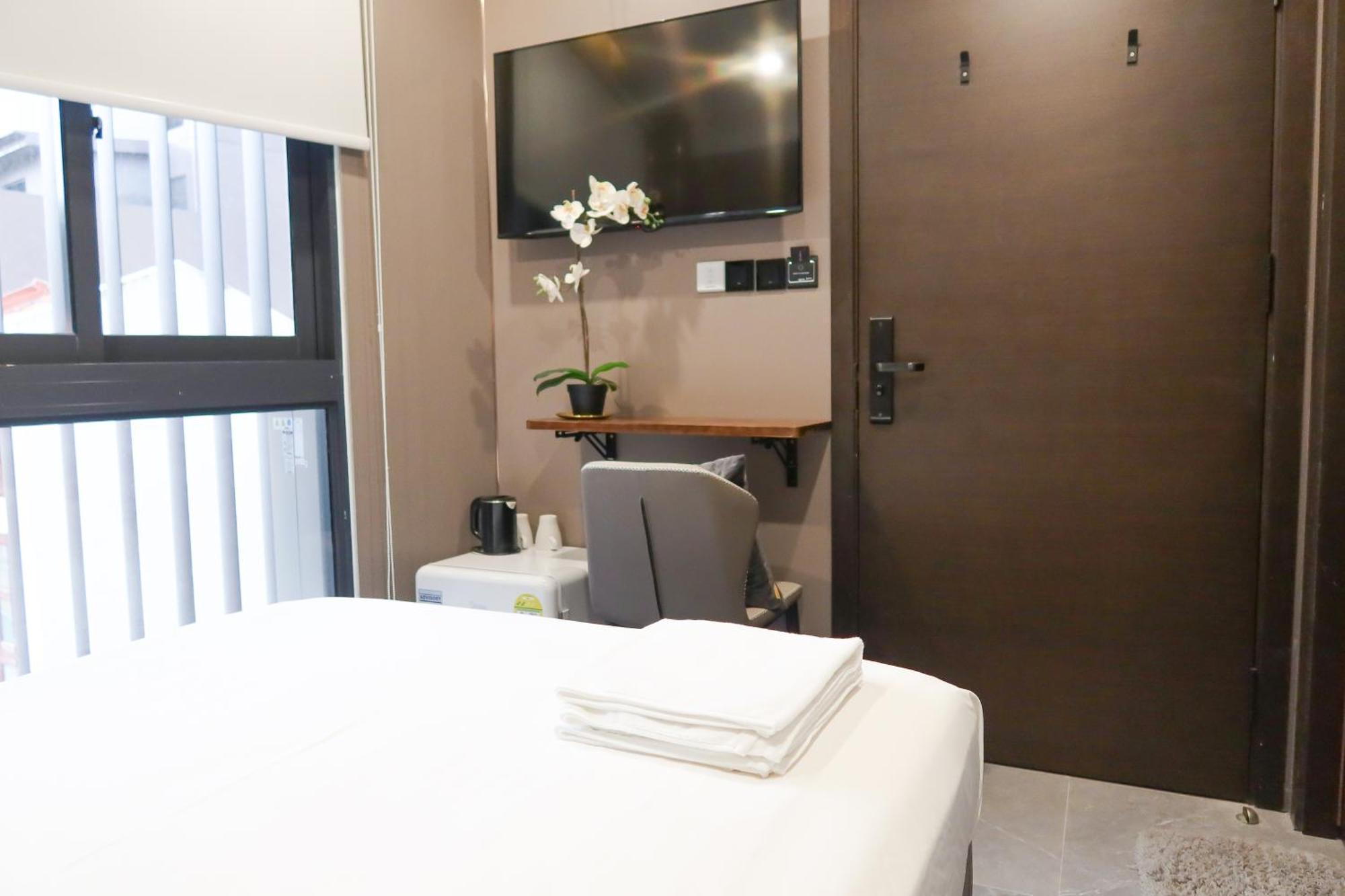 Recharge Studio Apartment & Suites Сінгапур Номер фото